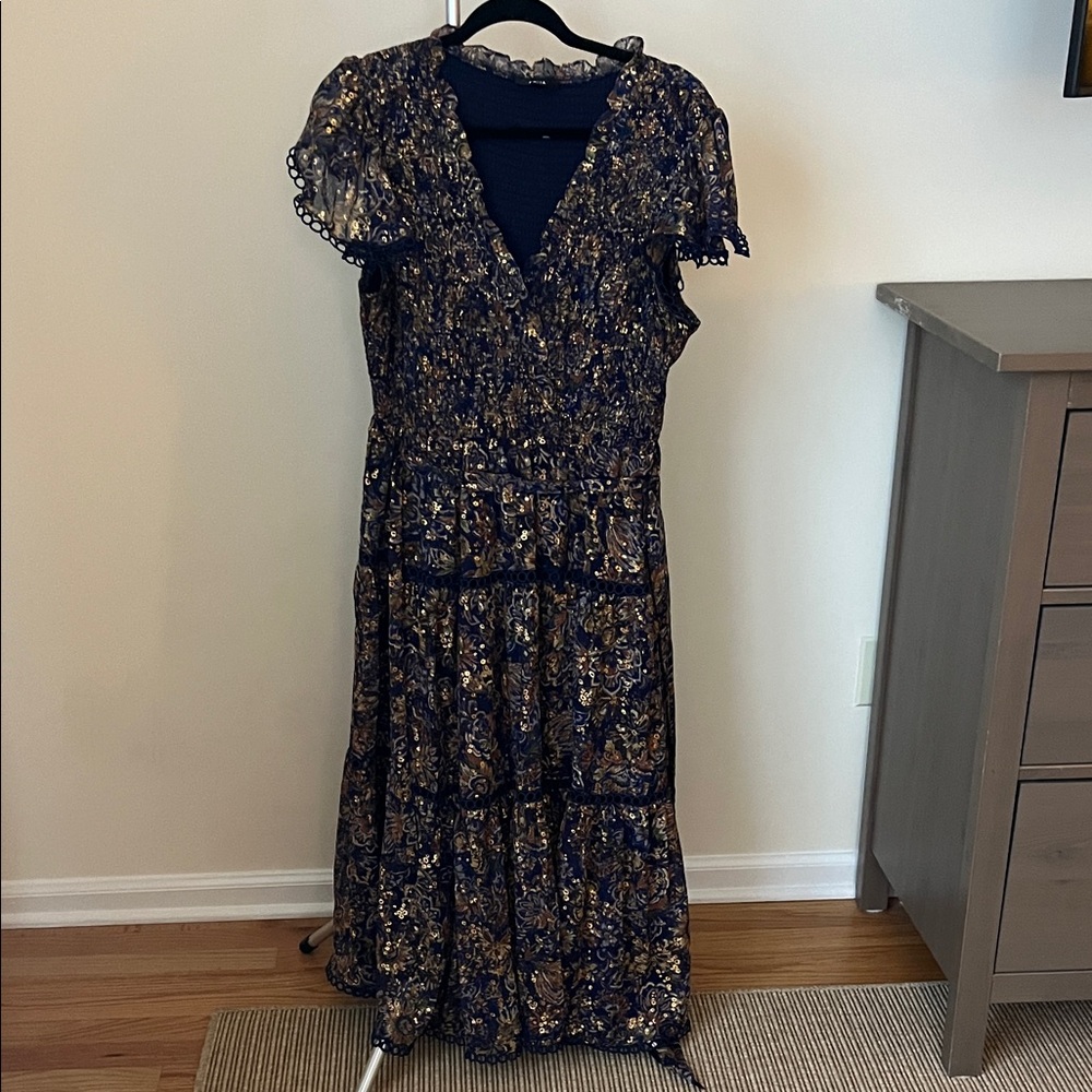 Aqua floral midi dress with a deep navy blue and gold color scheme with a belt.